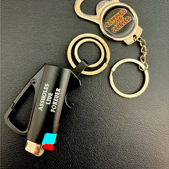Other - 2 Assholes live forever keychains. Lighter keychain and bottle opener